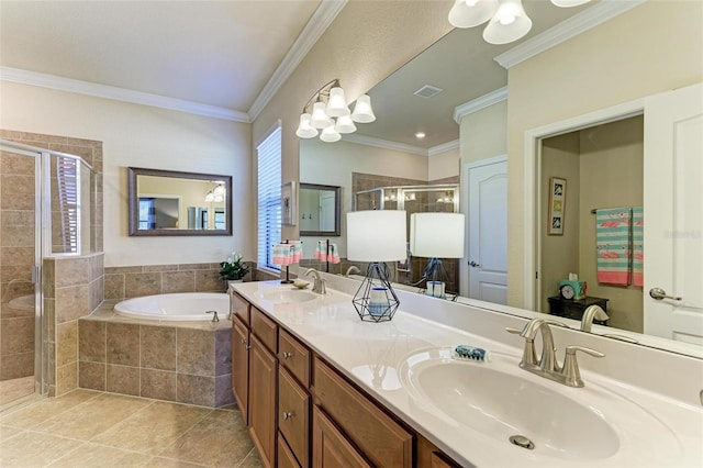 bathroom with crown molding, vanity, and shower with separate bathtub