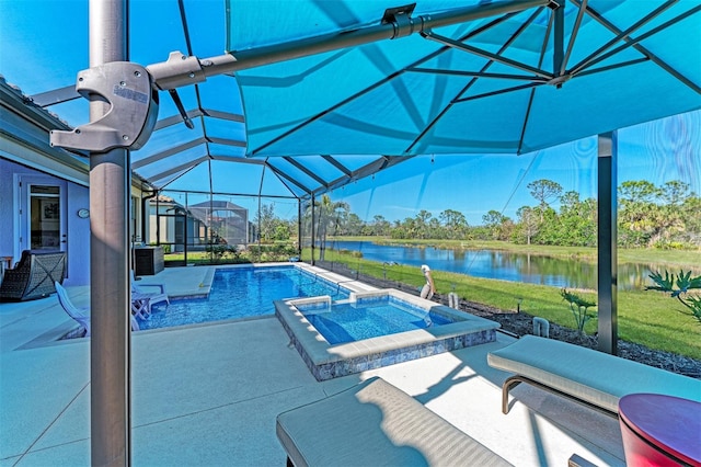 view of pool featuring a patio, a lanai, a water view, and an in ground hot tub