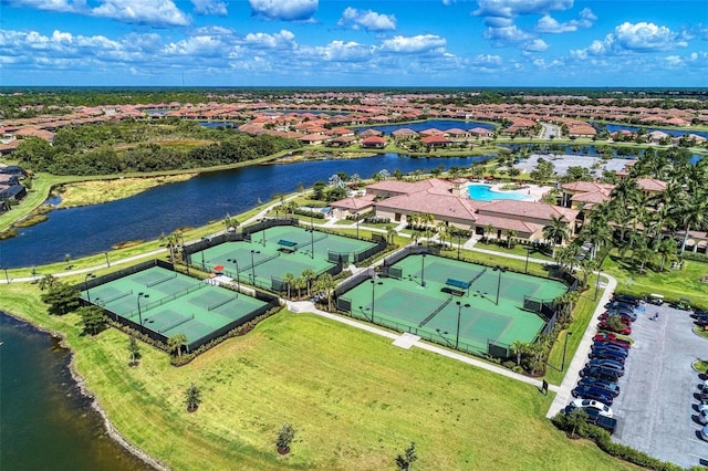 drone / aerial view with a water view