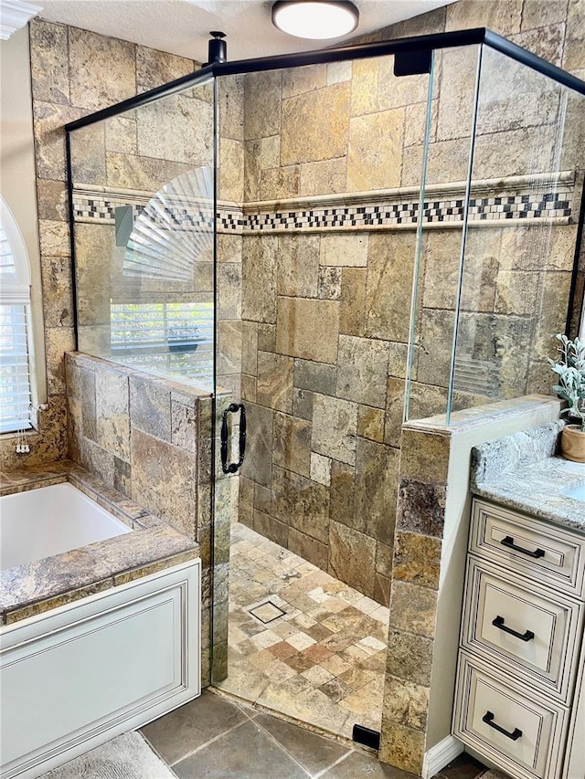 bathroom with plus walk in shower and vanity