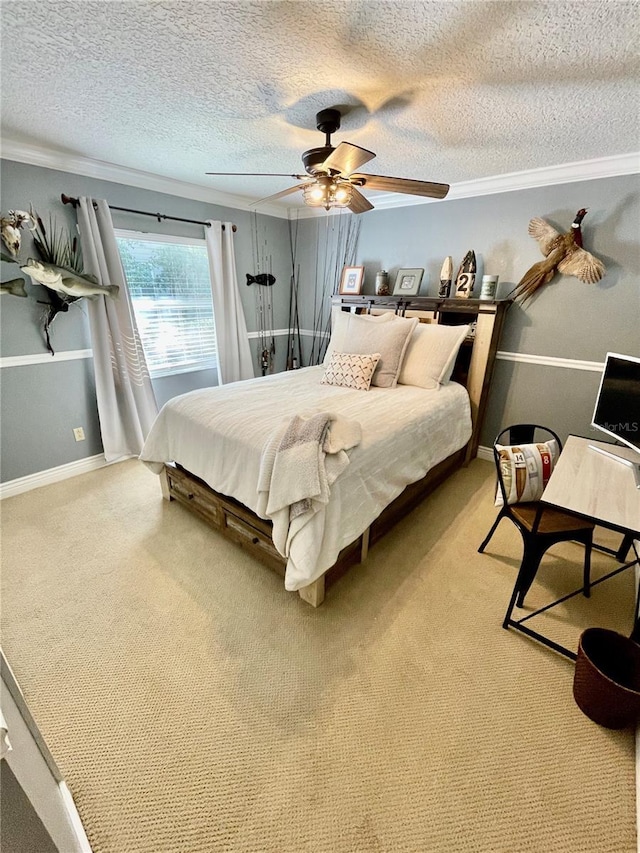 carpeted bedroom with crown molding, a textured ceiling, and ceiling fan