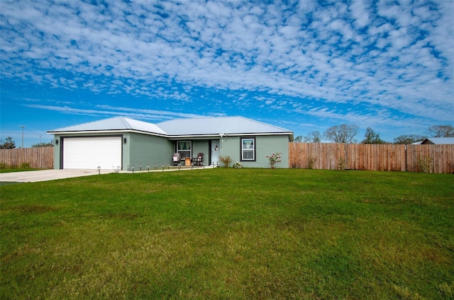 ranch-style home with a garage and a front yard