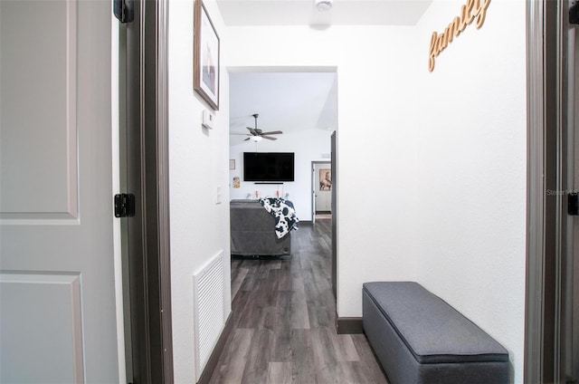 corridor featuring hardwood / wood-style floors