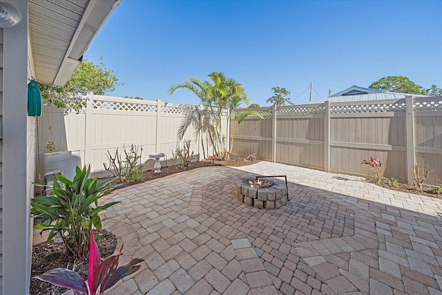 view of patio / terrace featuring a fire pit