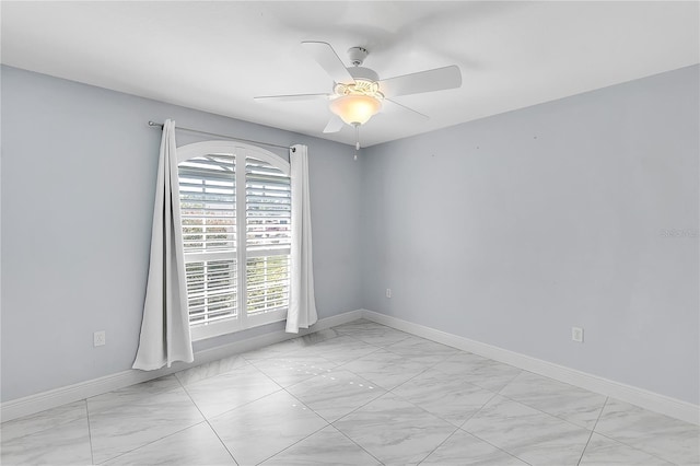 unfurnished room featuring ceiling fan