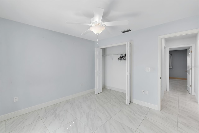 unfurnished bedroom featuring a closet and ceiling fan