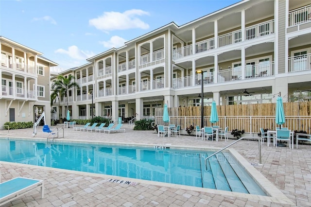 view of swimming pool with a patio