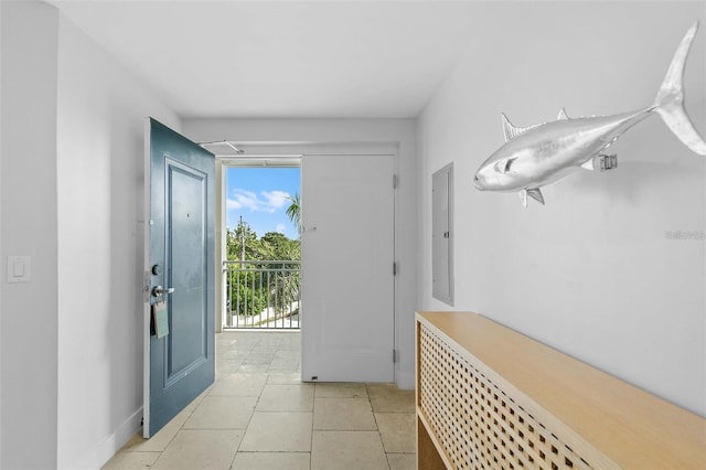 tiled entryway featuring electric panel