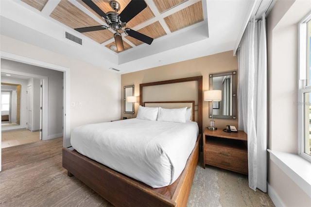 bedroom featuring wood ceiling and ceiling fan