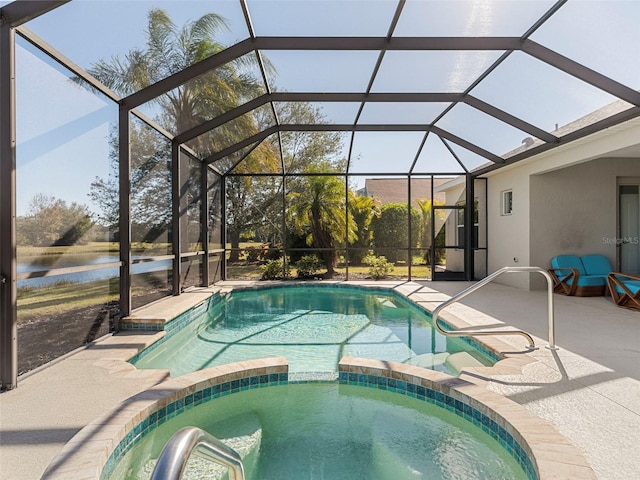 view of swimming pool featuring a water view, an in ground hot tub, a patio area, and glass enclosure