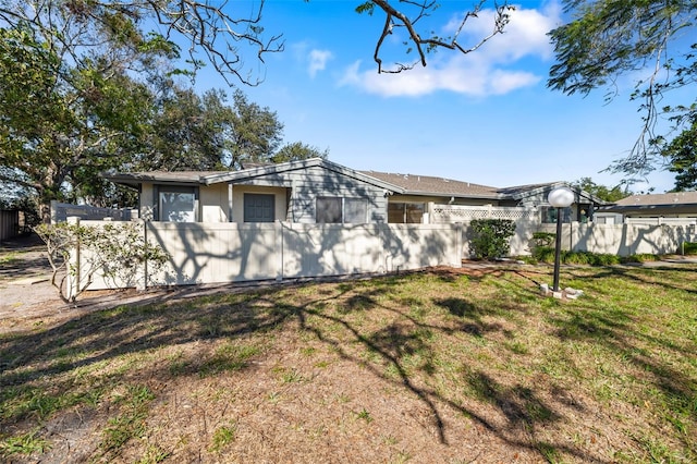 exterior space with a front yard