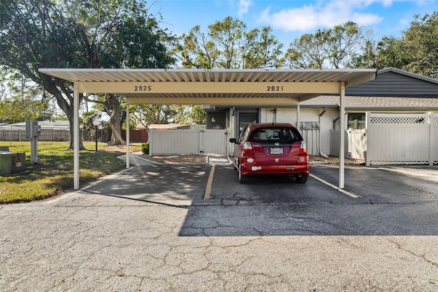 view of parking with a carport