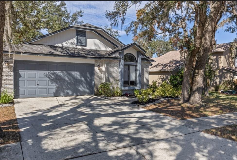 ranch-style house featuring a garage