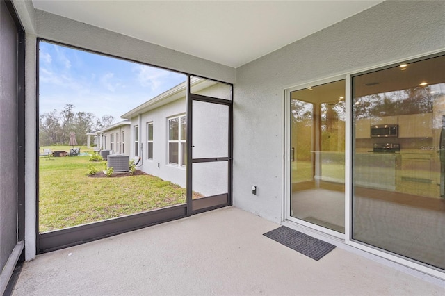 unfurnished sunroom featuring a healthy amount of sunlight