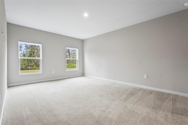 view of carpeted spare room