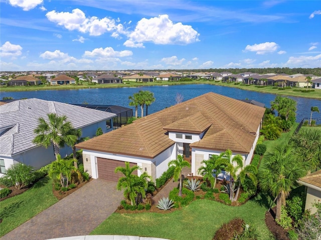 drone / aerial view with a water view