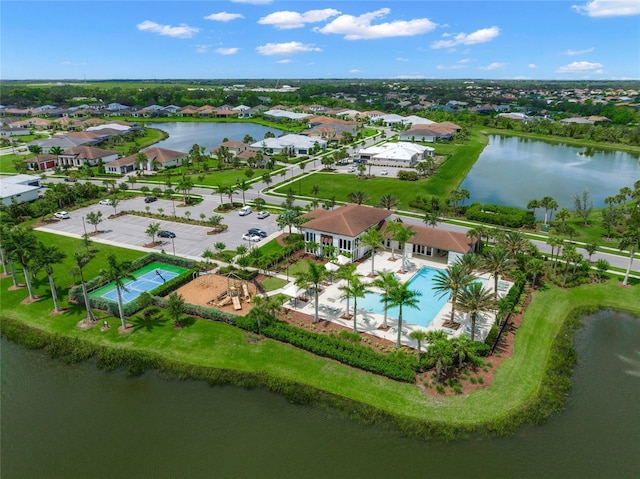 birds eye view of property featuring a water view