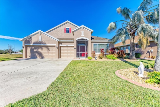 view of front of house featuring stucco siding, driveway, an attached garage, and a front lawn