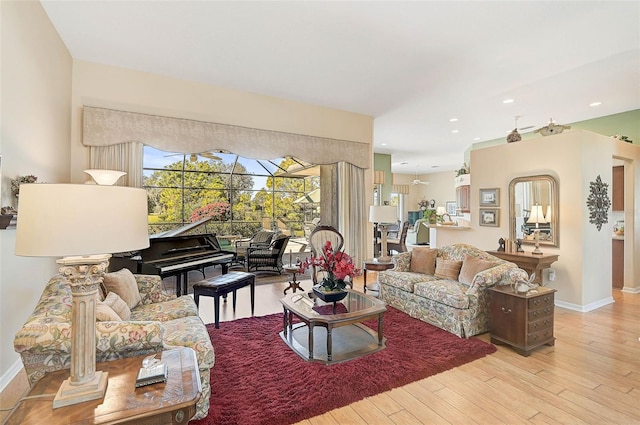 living room with light hardwood / wood-style flooring