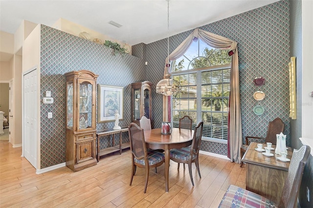 dining room featuring light hardwood / wood-style floors