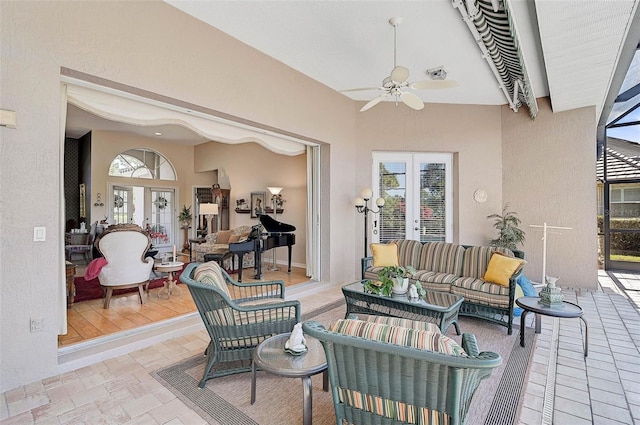 view of patio / terrace with french doors, ceiling fan, and outdoor lounge area