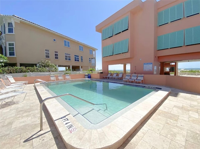 view of pool with a patio area