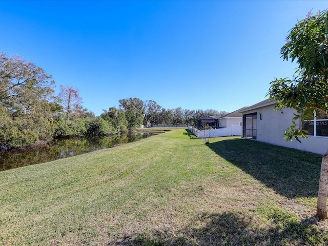 view of yard with a water view