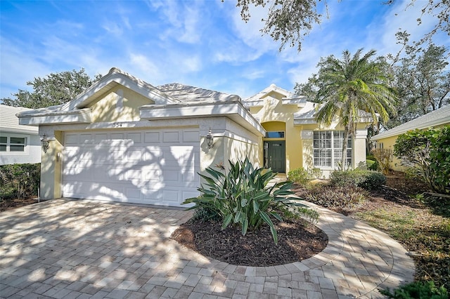 view of front of property featuring a garage