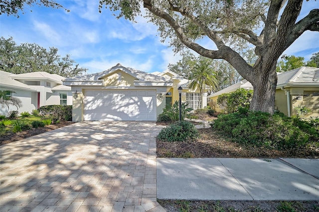 view of front of property featuring a garage