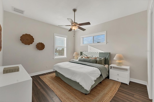 bedroom featuring ceiling fan and dark hardwood / wood-style flooring