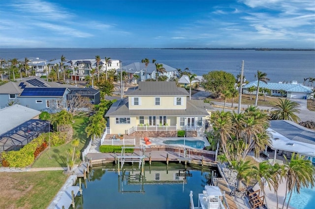 drone / aerial view with a water view