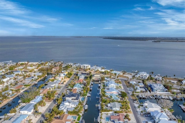 drone / aerial view with a water view