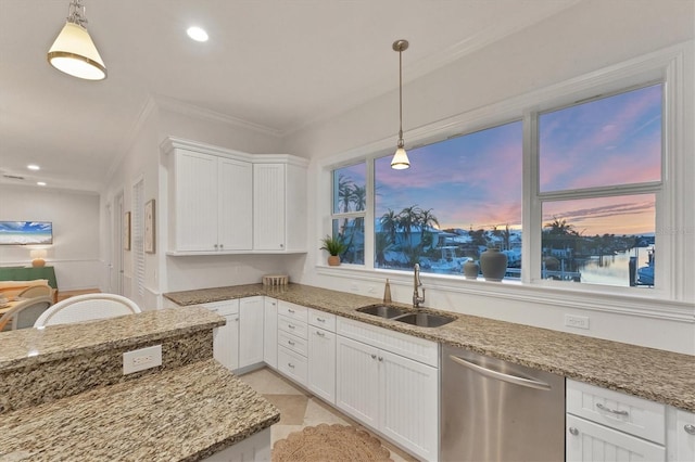 kitchen with sink, white cabinetry, light stone counters, stainless steel dishwasher, and pendant lighting