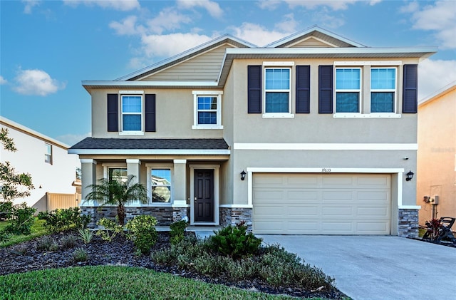 view of front of home with a garage