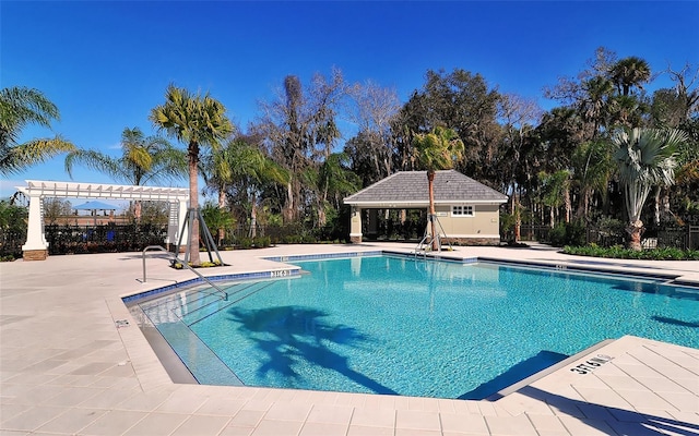 view of swimming pool with a pergola and a patio area