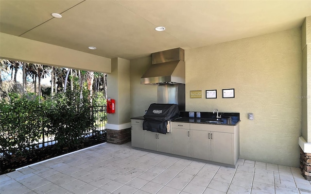 view of patio with grilling area, exterior kitchen, and sink