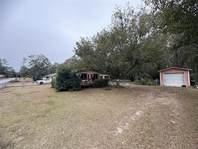 view of yard featuring a garage