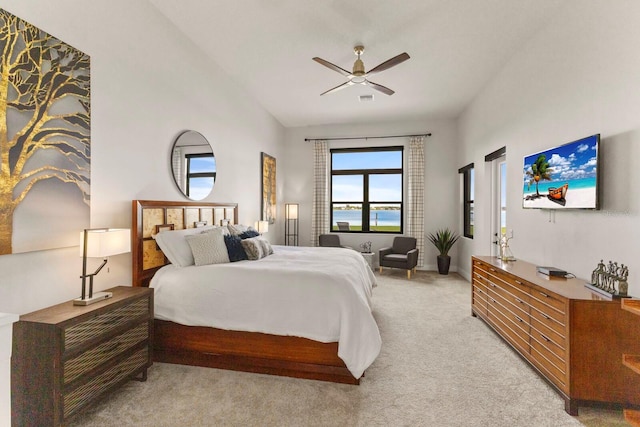 carpeted bedroom with ceiling fan