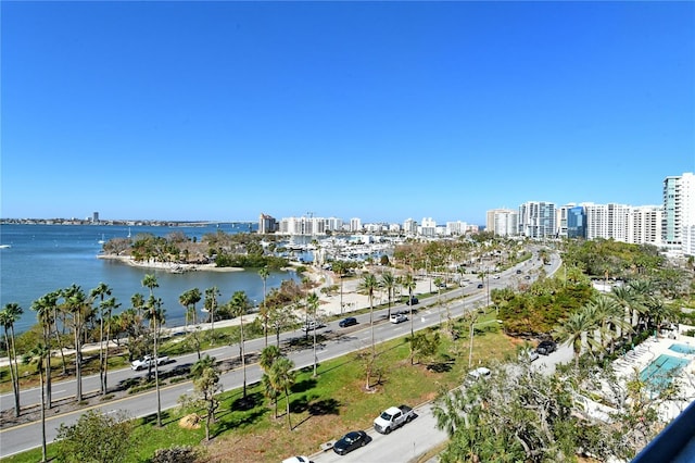 birds eye view of property with a water view