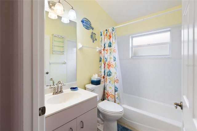 full bathroom featuring shower / tub combo, vanity, and toilet