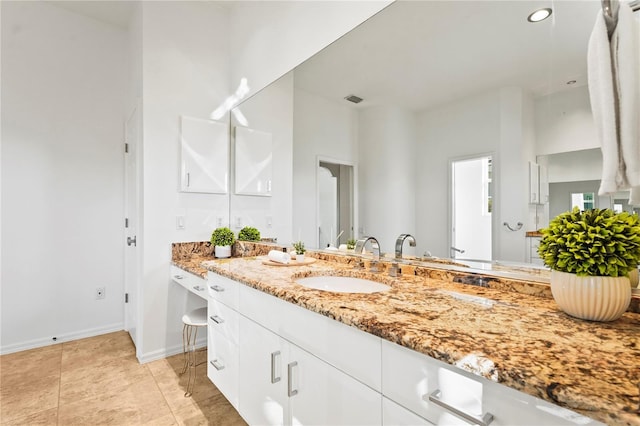 bathroom featuring recessed lighting, tile patterned flooring, baseboards, and vanity