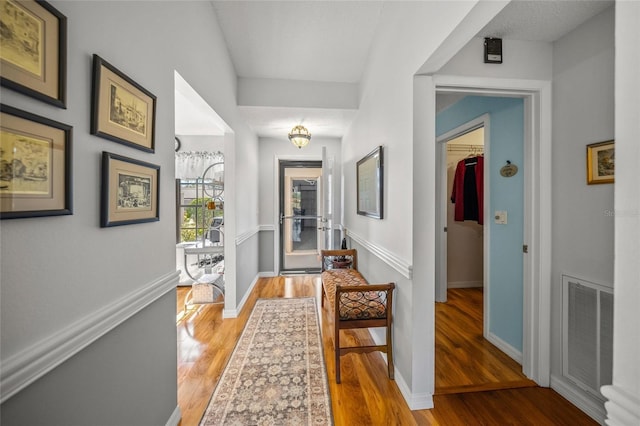 hallway featuring light wood-type flooring