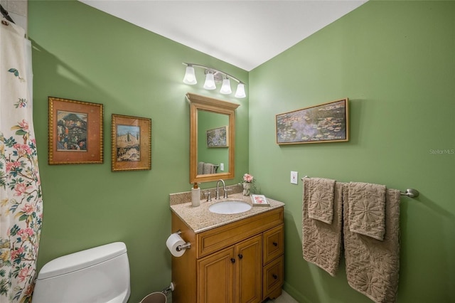 bathroom with vanity and toilet