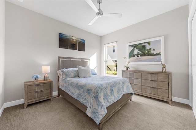 bedroom featuring light colored carpet and ceiling fan