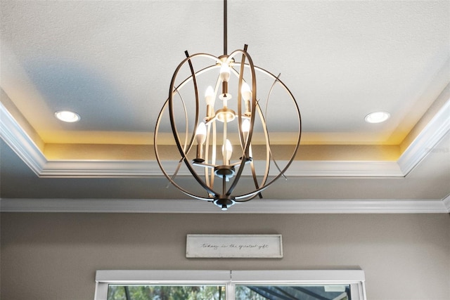 interior details with an inviting chandelier and a textured ceiling