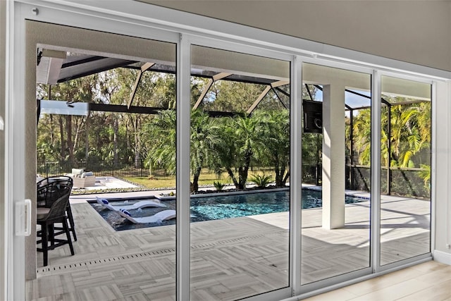 doorway to outside featuring hardwood / wood-style flooring