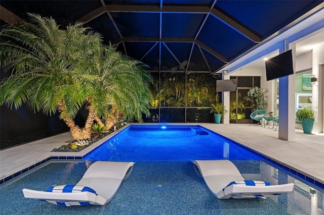 view of swimming pool with a patio