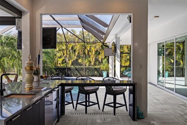 sunroom / solarium with sink