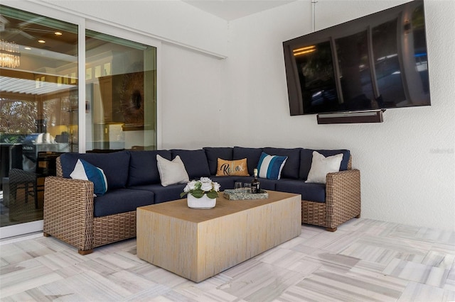 living room with an outdoor hangout area and a patio