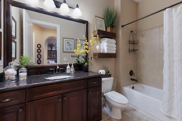 full bathroom with shower / bathtub combination with curtain, vanity, and toilet